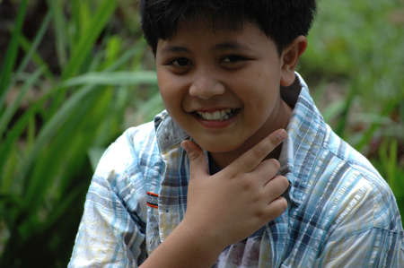 young boy with cute face の写真素材