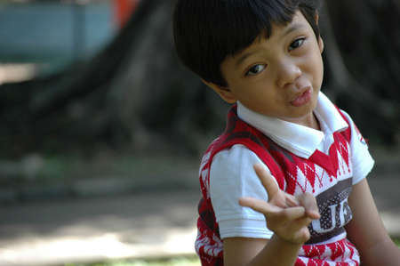 little boy with cute face の写真素材