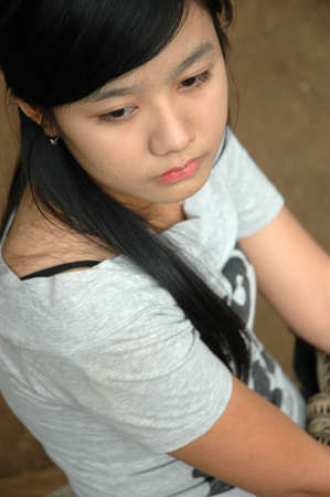 young lady looking for somethingの写真素材