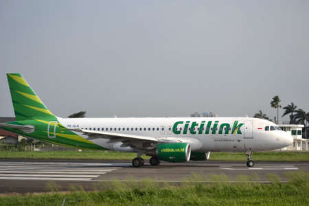 bandung, indonesia-june 16, 2014  Citilink airplane taking manoeuvre on husein sastranegara airport...