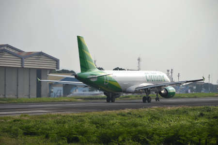 bandung, indonesia-june 16, 2014  Citilink airplane taking manoeuvre on husein sastranegara airport...