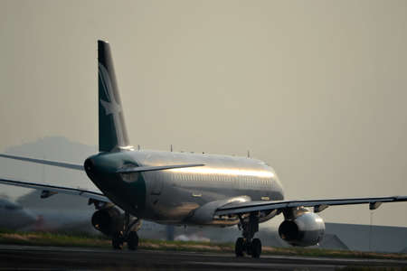 bandung, indonesia-june 16, 2014  Silk Air airplane taking manoeuvre on husein sastranegara airport bandung のeditorial素材
