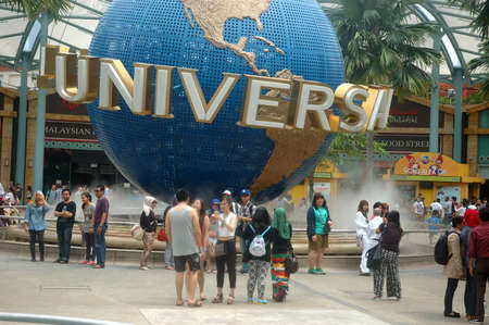 Sentosa island, Singapore - January 18, 2014: People crowd at Universal Studio Singapore.のeditorial素材