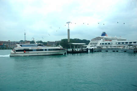 Harbour Front, Singapore - January 18, 2014: Scenery of cruise and boat harbour at Harbour Front, Singapore.のeditorial素材