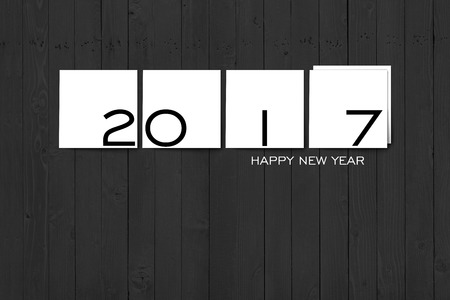 2017 Happy New Year Concept, Texts on White Square Labels on Grey Wall Texture