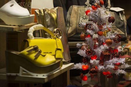 Decorated Christmas Tree in Shopping Counter; Red Christmas Ornaments, Heart and Balls, on  Xmas Tree. Happy New Yearの写真素材