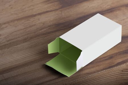 Opened empty pillbox on wooden table background, editable mock up template ready for your design...