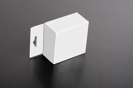 White box with hanger on dark ground, editable mock-up series template ready for your design,...