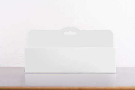 Rectangular box package mockup with hanger on table, editable mock-up series template ready for your...