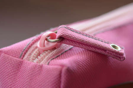 Pink pencil case with closed zip