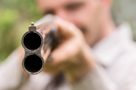 Aiming double-barreled shotgun