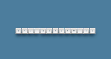 Brainstorming text on a 3d keyboard button with shadow, 3d illustrationの写真素材
