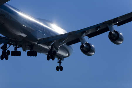 An airplane flying in the blue sky