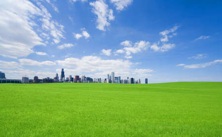 Green grass and  downtownの写真素材