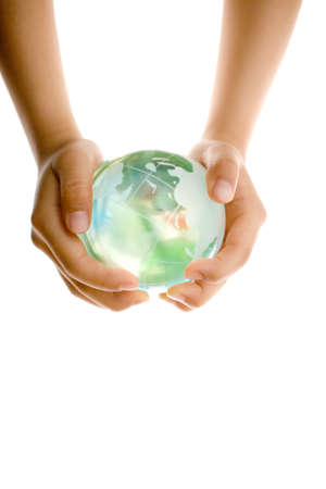 Child holding a globe in hands.の写真素材