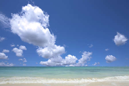 Tropical sand, beach and blue skyの写真素材