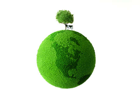 Calf standing on green earthの写真素材