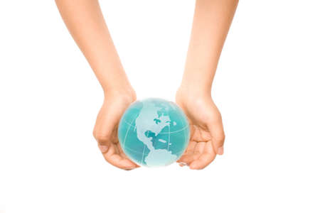 Child holding a globe in hands.の写真素材