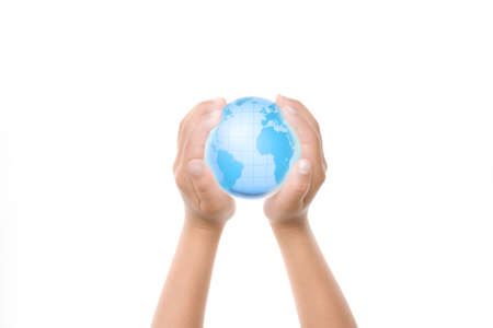 Child holding a globe in hands.の写真素材