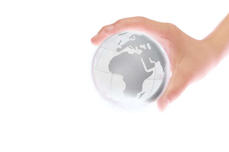 Child holding a globe in handの写真素材