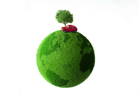 Red car on green earthの写真素材