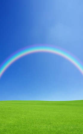 Green grass and rainbowの写真素材