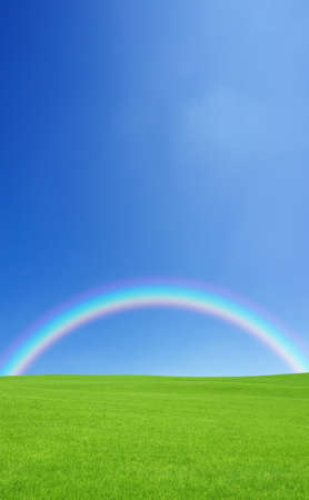 Green grass and rainbowの写真素材