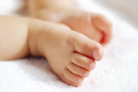newborn baby feetの写真素材