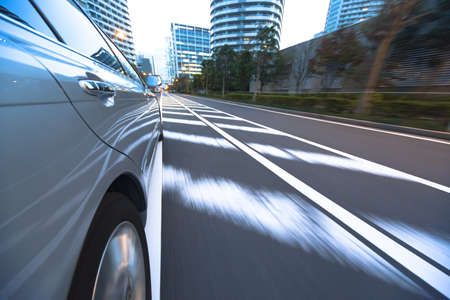 Driving in the sunset city.の写真素材