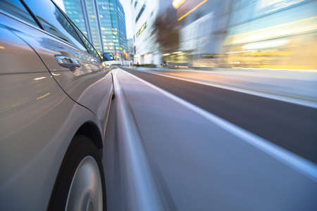 Driving in the sunset city.の写真素材