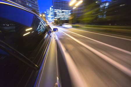 Driving in the night city.の写真素材