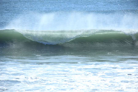 Big sea wave on a windy dayの写真素材