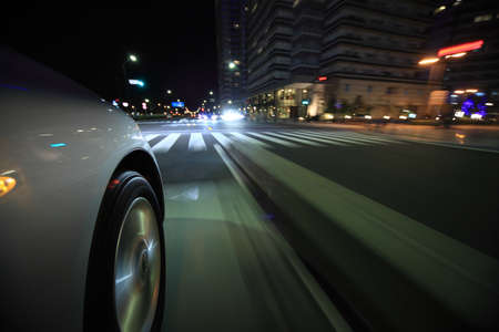 Driving in the night cityの写真素材