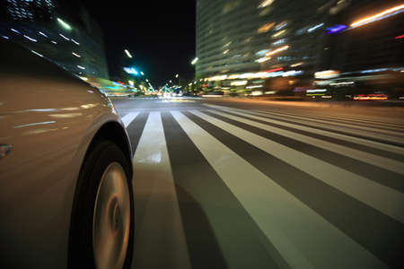 Driving in the night cityの写真素材