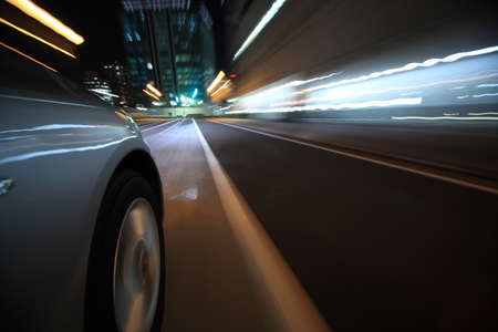 Driving in the night cityの写真素材
