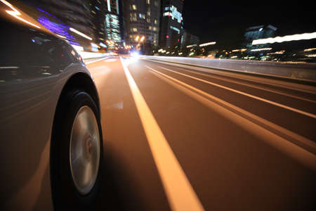 Driving in the night cityの写真素材