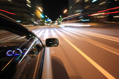 Night drive with car in motion.の写真素材