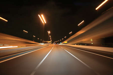 Driving on the night roadの写真素材