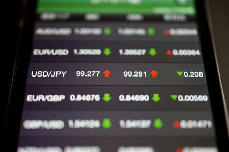 Foreign exchange market chart at smart phoneの写真素材