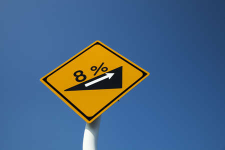 Traffic sign of the uphill slopeの写真素材