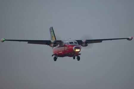 Warsaw, POLAND - December 22, 2016: Let 410 Turbolet landing on Warsaw Chopin airport.