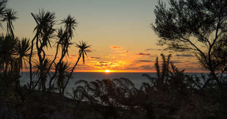 Ocean Sunset over Manu Bayの写真素材