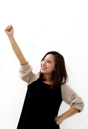 An ecstatic businesswomanの写真素材