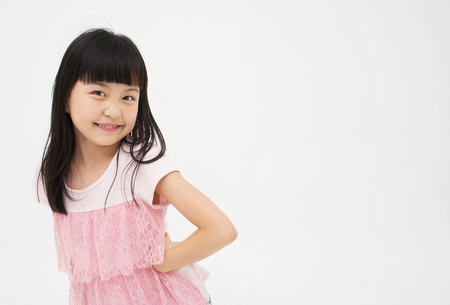 Happy little girl on white background の写真素材