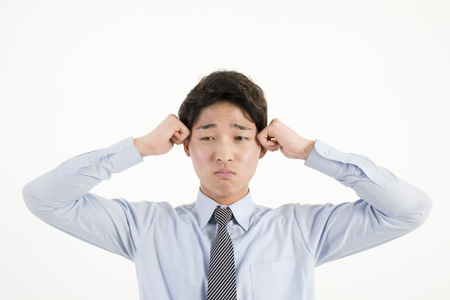Stressed asian businessmanの写真素材