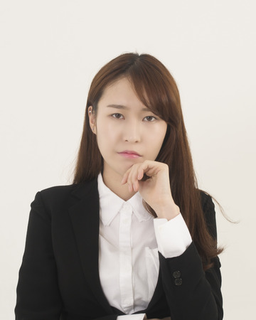 Stressed asian businesswomanの写真素材