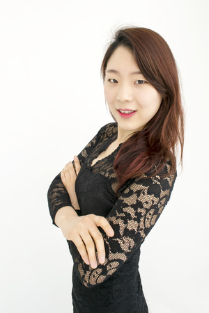 Sexy asian woman with her arms crossedの写真素材
