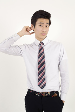 Stressed asian businessmanの写真素材