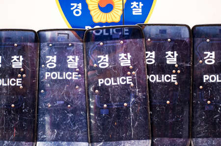 Several police shields in South Koreaの写真素材
