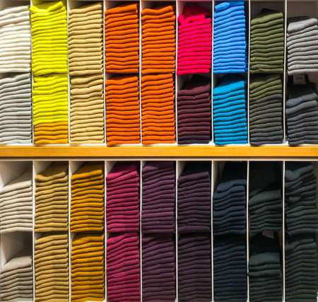 Multi-colour socks on the shelf for background useの写真素材